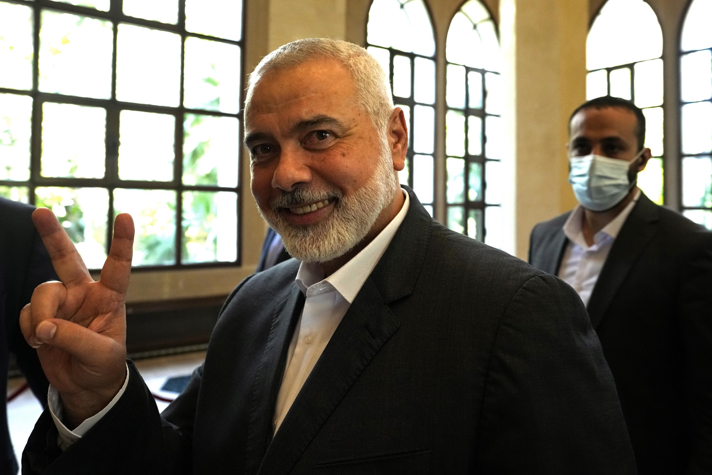 Ismail Haniyeh, the head of the Political Bureau of Hamas gestures to photographers with a peace sign after a meeting Lebanese Parliament Speaker Nabih Berri, Beirut, Lebanon, August 1 2021. (AP)