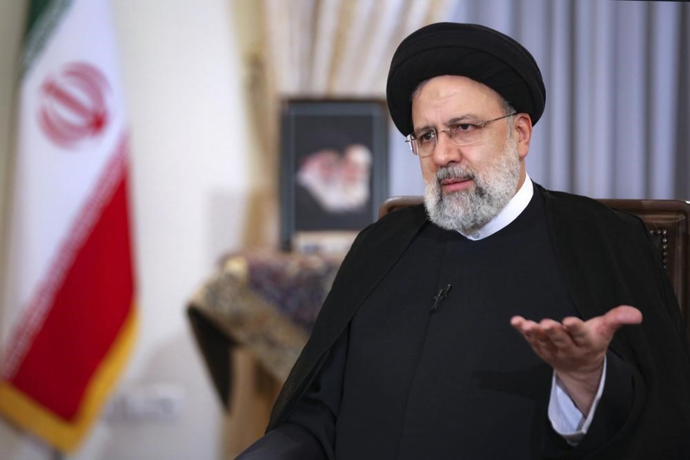  Iranian President Ebrahim Raisi during a live interview with state TV in Tehran Iran on Monday May 9, 2023.(AP)