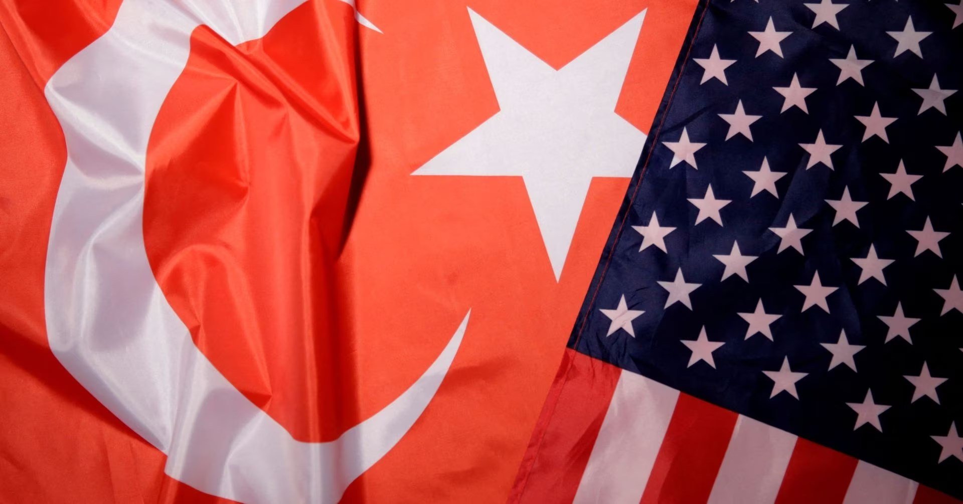 A Turkish flag is displayed next to the flag of the United States, August 25 2018. (Reuters)