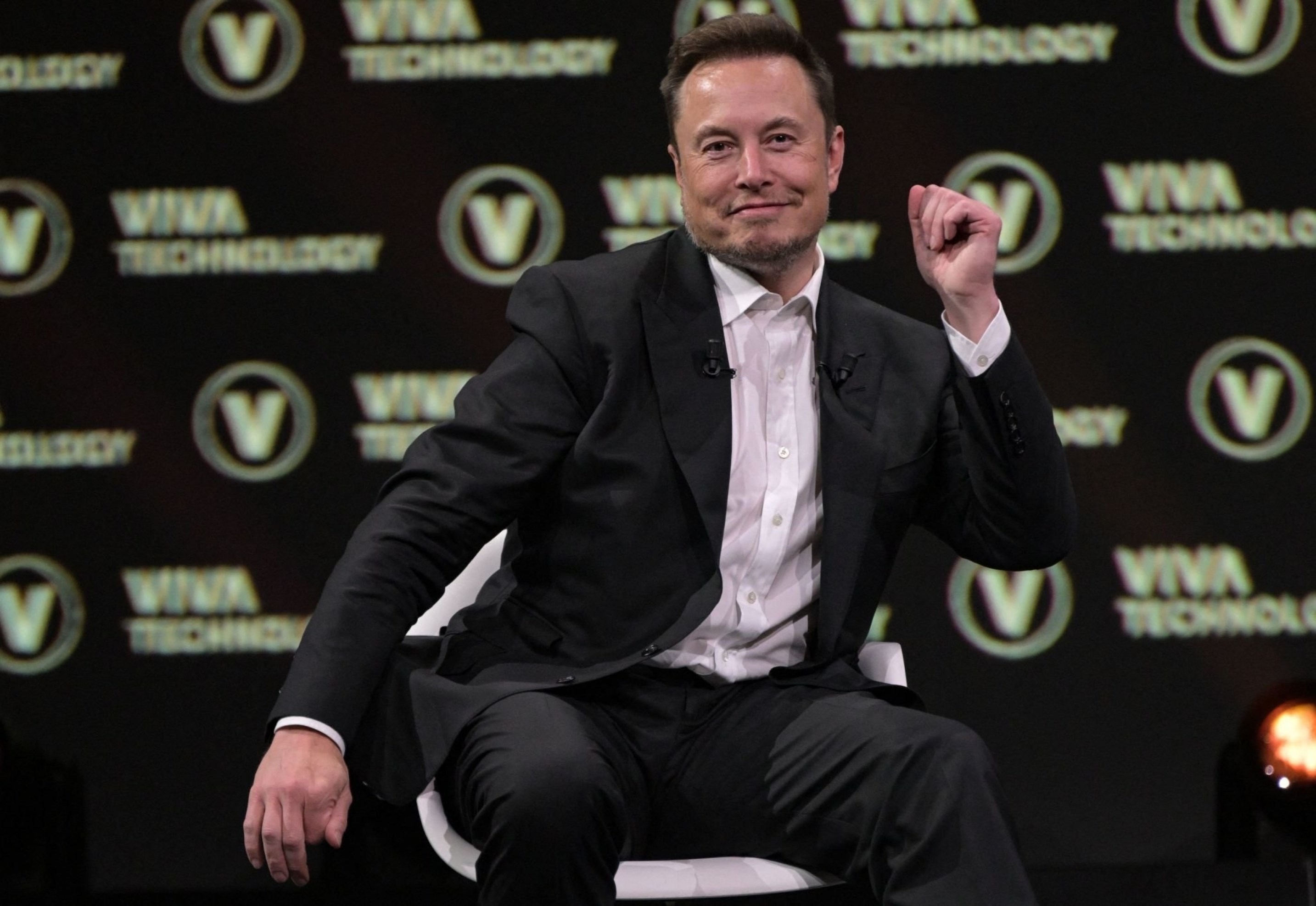 Multi billionaire Elon Musk dances while speaking at a Vivatech technology startups and innovation fair at Port de Versailles exhibition center in Paris, France, June 16 2023. (AFP)
