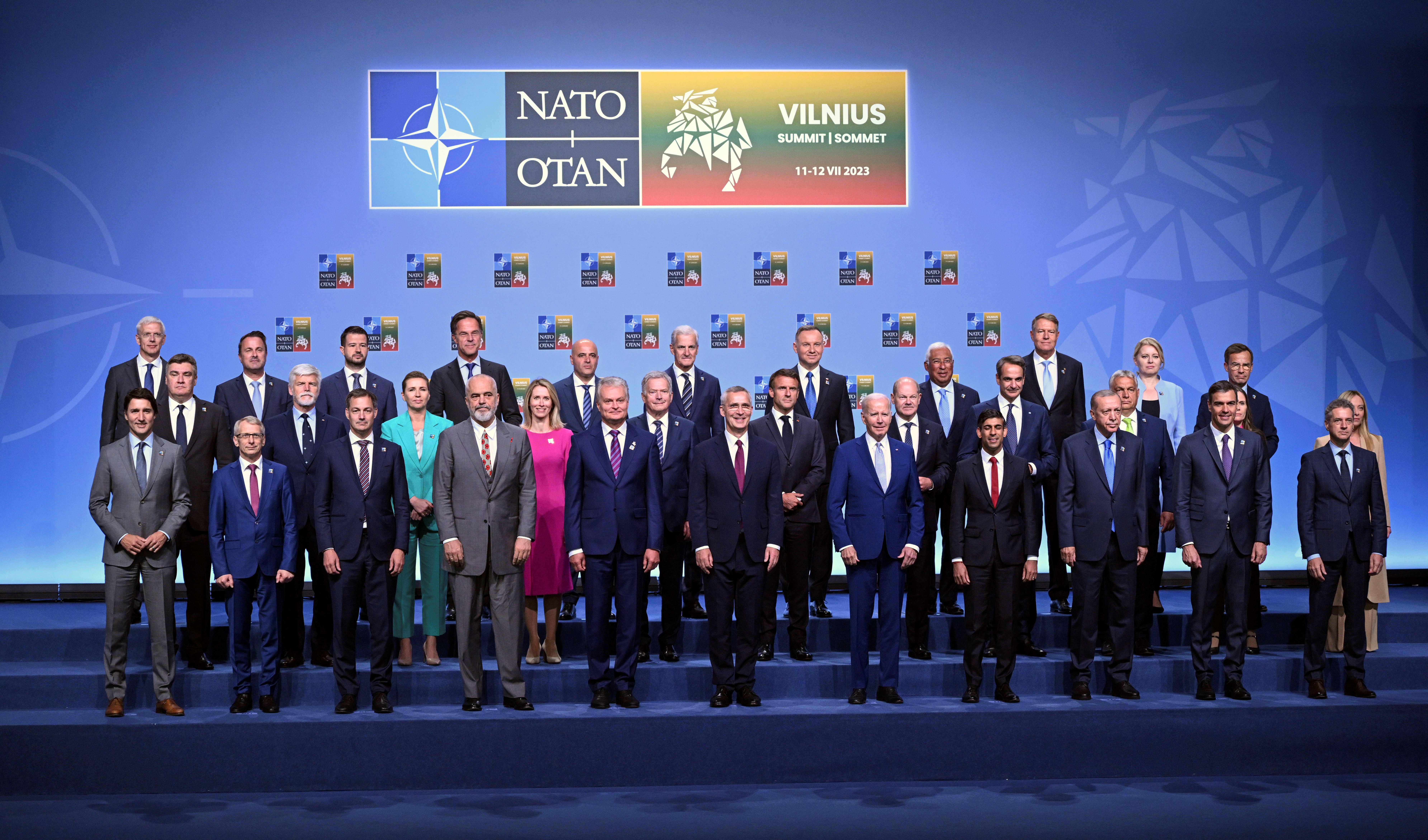 NATO Secretary General Jens Stoltenberg, center, poses for an official family photo with the participants of the NATO Summit in Vilnius, Lithuania, Tuesday, July 11, 2023. (AP)