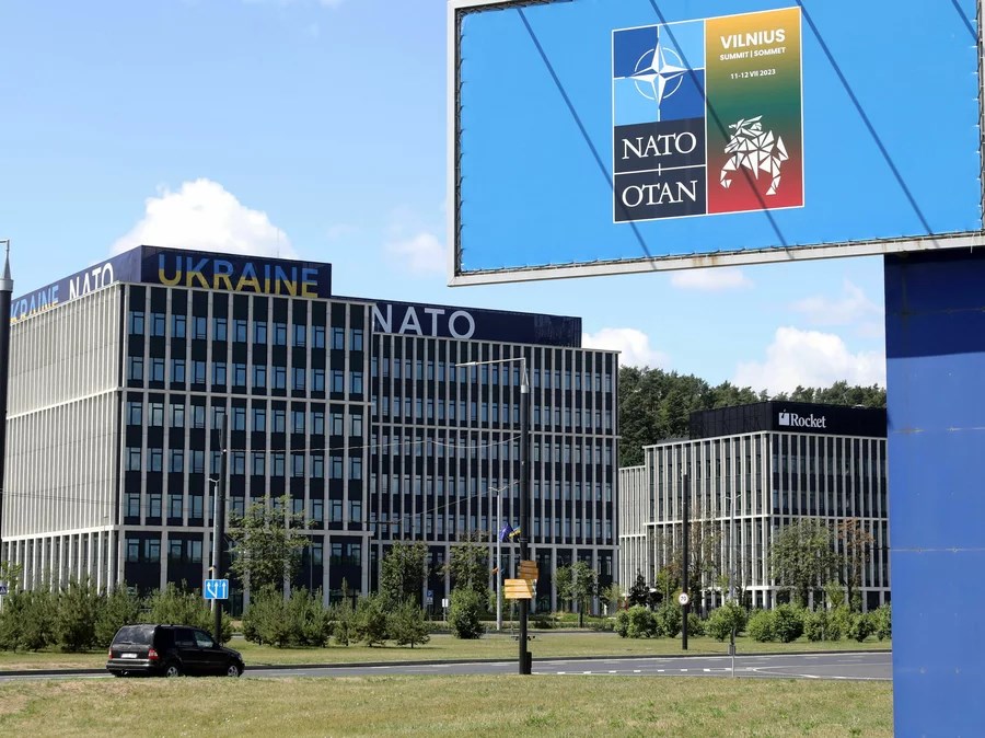 Ukraine may receive 'Israel-Banners reading 'Ukraine' and 'NATO' are seen on the NATO Summit venue in Vilnius, Lithuania on July 9, 2023 (AFP)' security guarantee from West