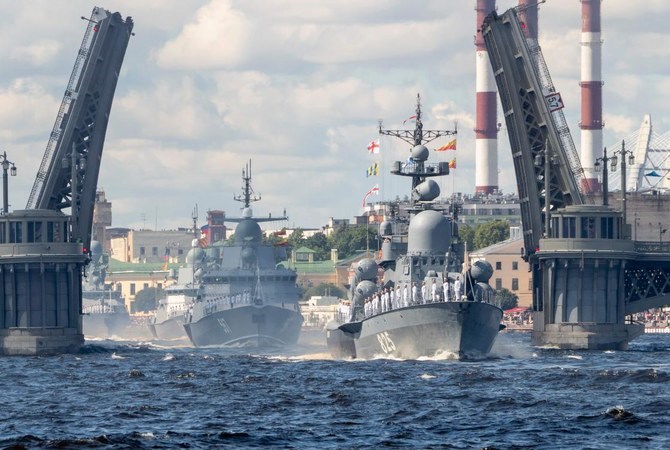 Russian warships sail on the Neva river during the Navy Day parade in Saint Petersburg on July 26, 2020 (AFP)
