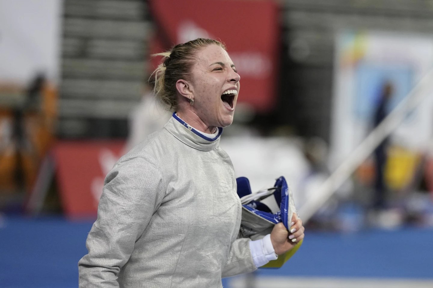 FILE - Olga Kharlan of Ukraine reacts after defeating Cyrielle Rioux of France during the women's FIE fencing sabre grand prix competition in Seoul, South Korea, Saturday, April 29, 2023. (AP)