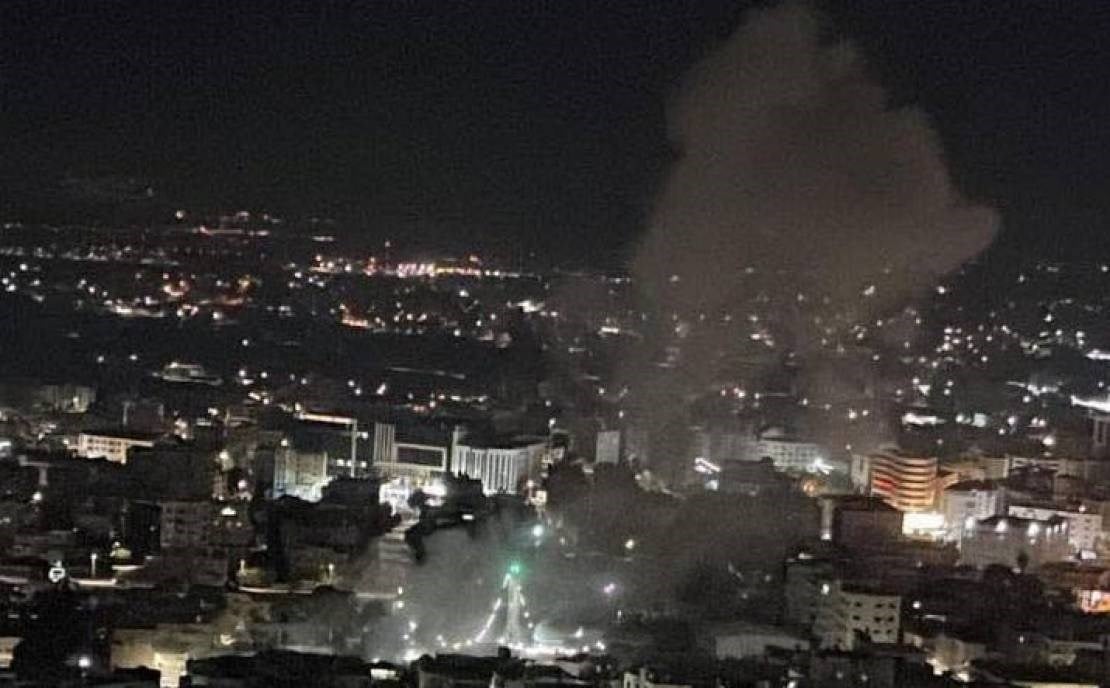 A plume of smoke rises after Israeli occupation aircraft target a house in Jenin on Monday, July 3, 2023.