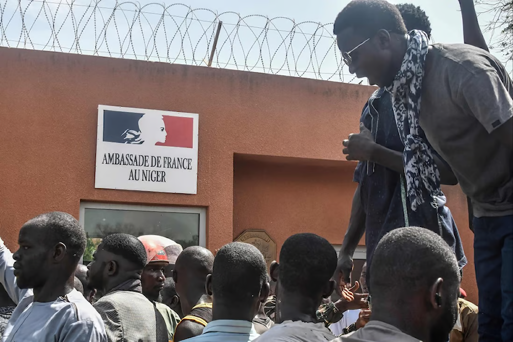 Protesters gather in front of the French embassy in Niamey during a demonstration that followed a rally in support of Niger’s junta (AFP)