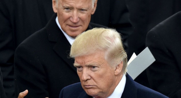 Current US President Joe Biden and former President Donald Trump at Trump's inauguration in 2017 (AFP)