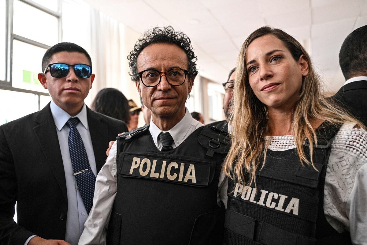 Christian Zurita, center, and his running mate Andrea Gonzalez following a press conference in Quito on Aug. 13. ( AFP via Getty Images)