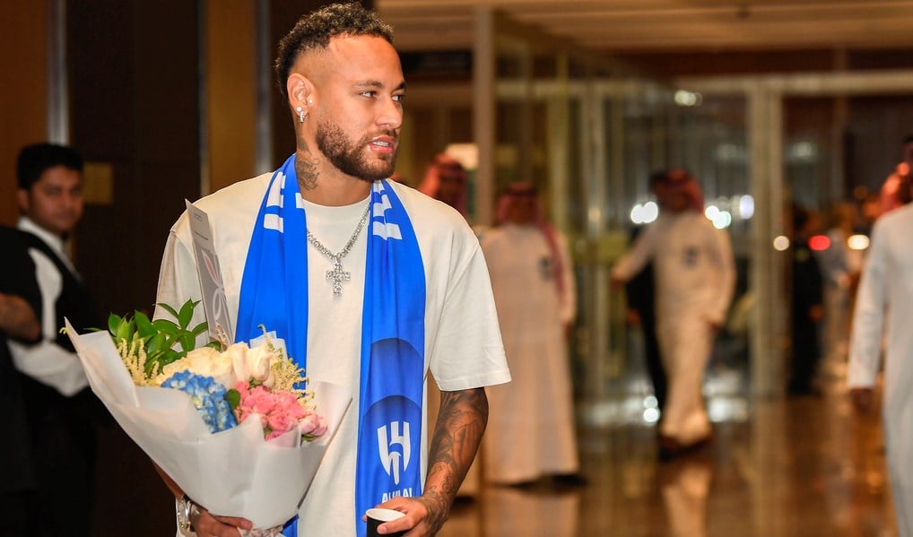 Brazilian national team's historical top scorer and the star of Paris Saint-Germain, Neymar Jr. arrives at King Khalid International Airport in Riyadh, Saudi Arabia, Friday, Aug. 18, 2023. (AP)