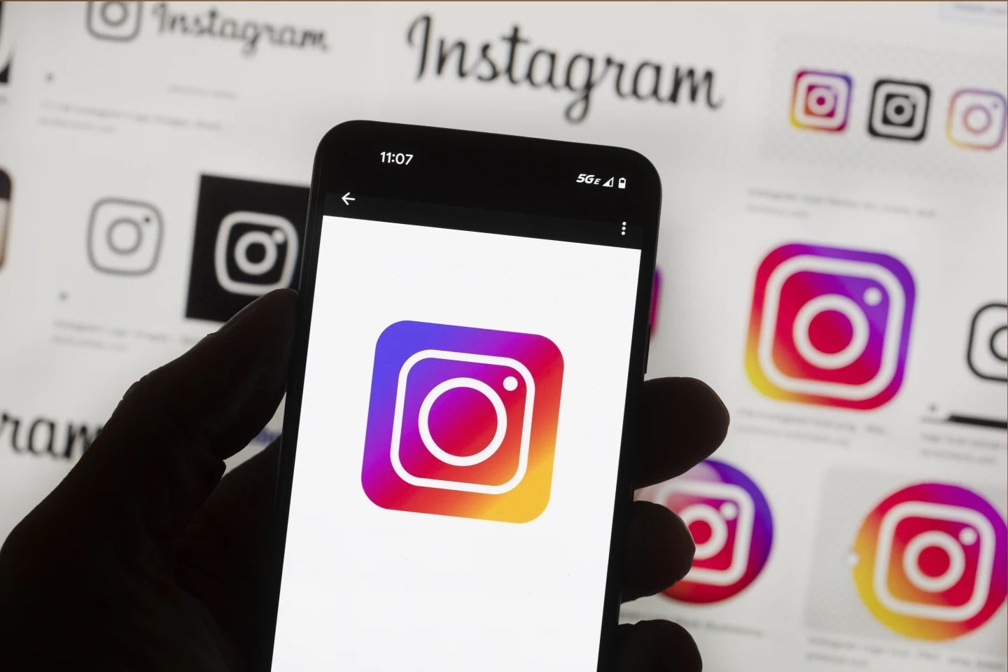 The Instagram logo on a phone in October 2022 in Boston, Massachusetts, US (AP)