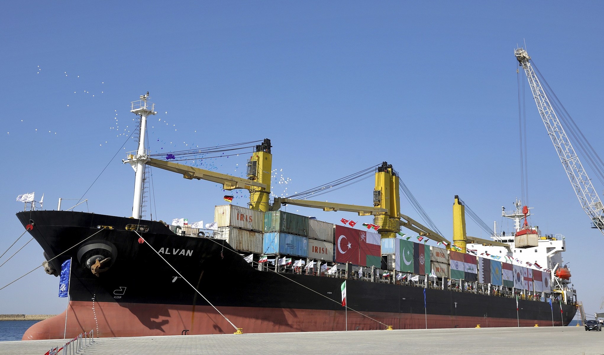 A cargo ship is docked during the inauguration ceremony of the newly built extension in the port of Chabahar on the Gulf of Oman, southeastern Iran, near the Pakistani border, December 3, 2017. (AP)