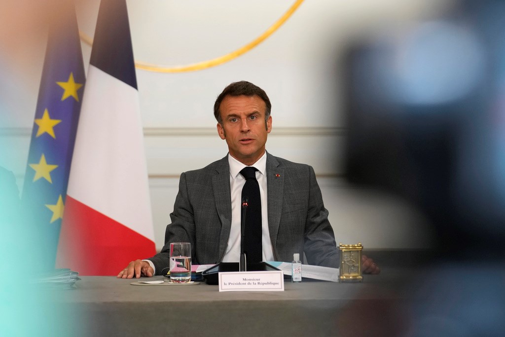 French President Emmanuel Macron speaks as he chairs a cabinet meeting after a cabinet reshuffle Friday, July 21, 2023 at the Elysee Palace in Paris. (AP)