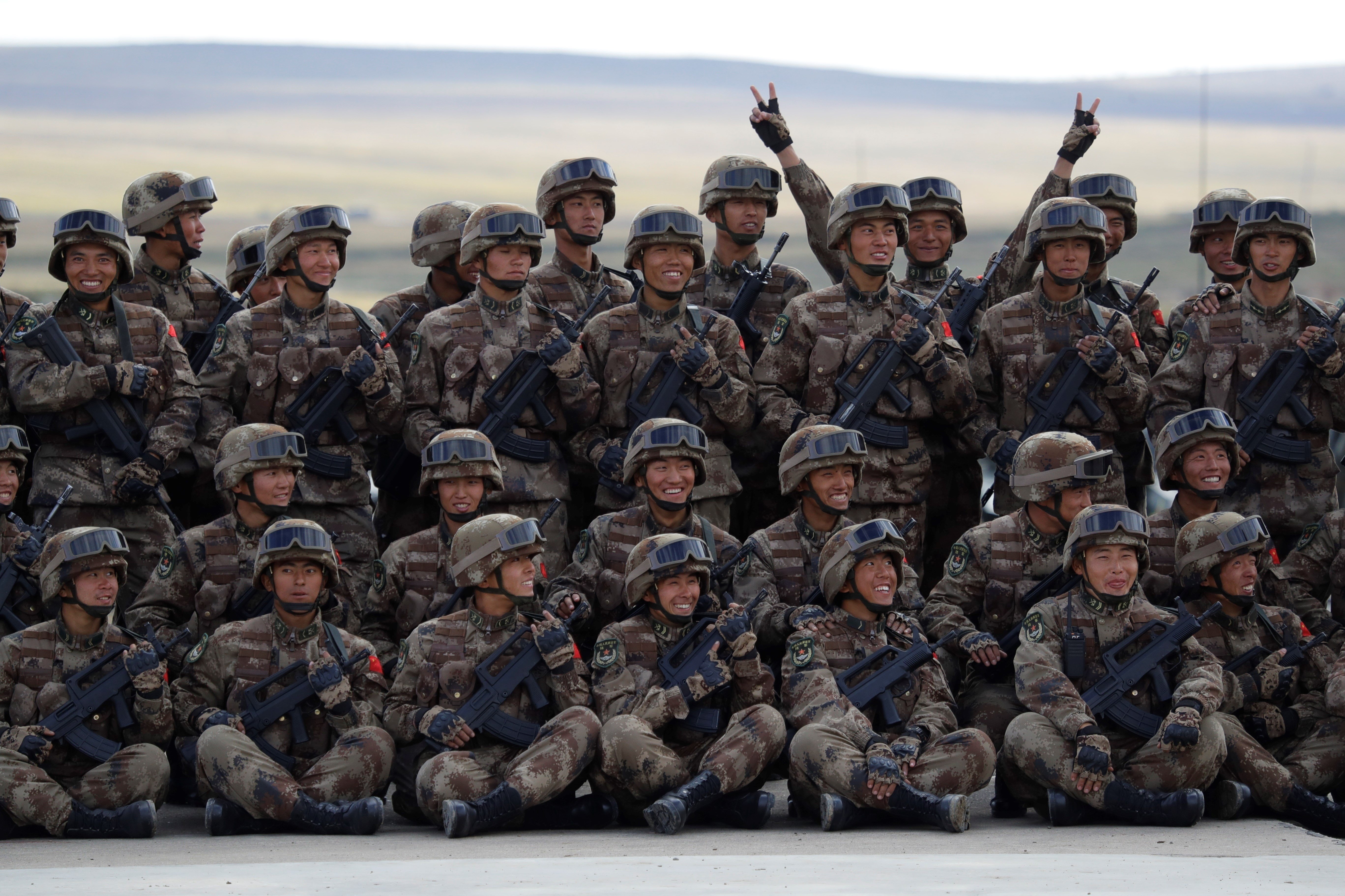 President Xi emphasizes need to develop military capacity, training