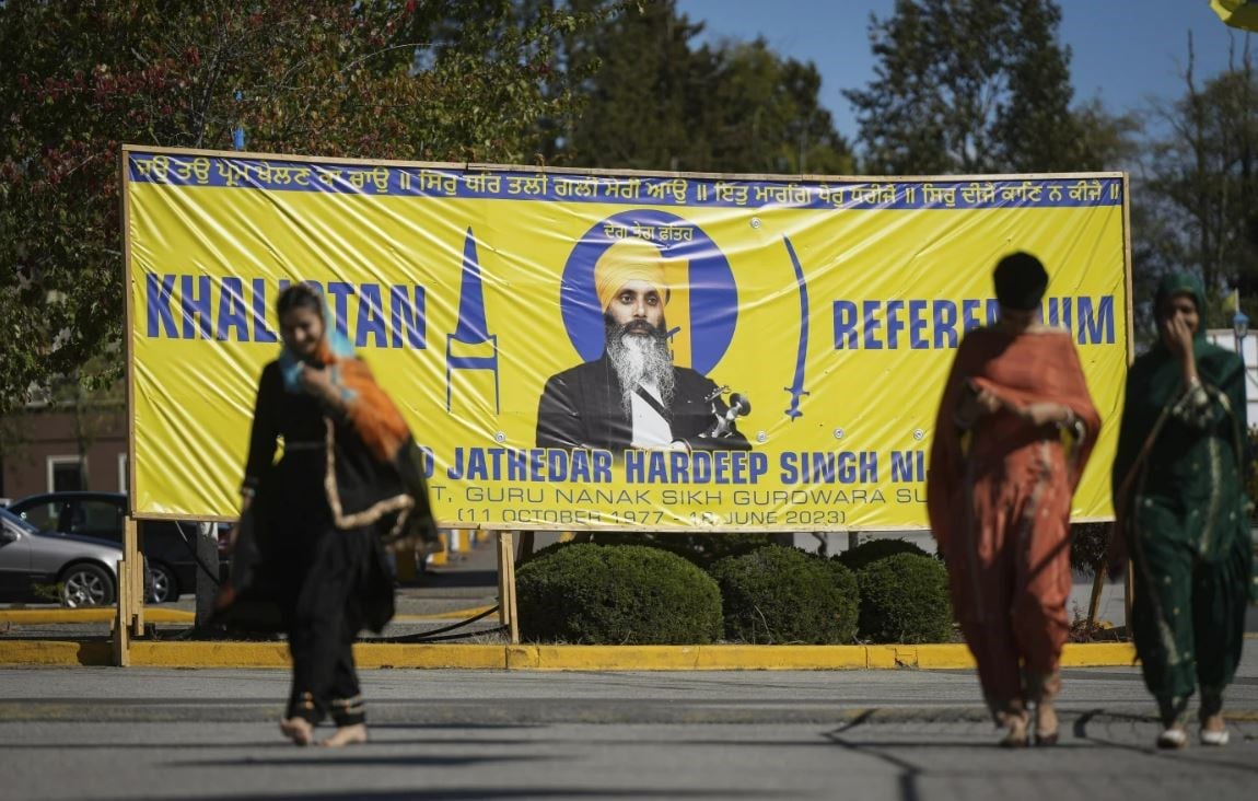 A photograph of late Hardeep Singh Niijar is seen on banner in Surrey, British Columbia on Monday September 18, 2023. (AP)