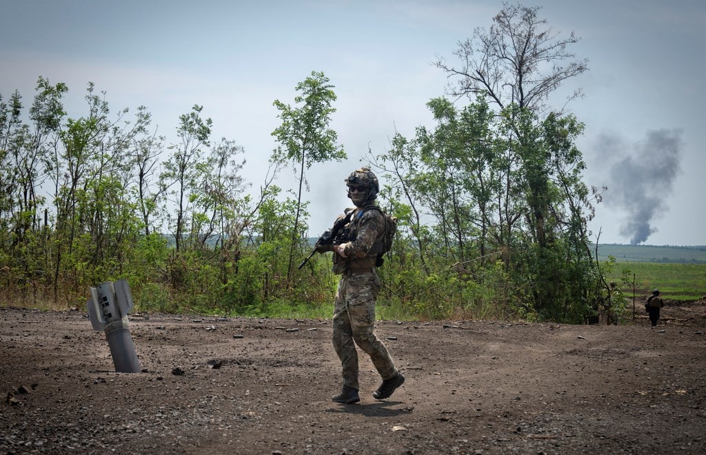 Ukrainian soldiers walk in their positions on the frontline in Zaporizhzhia region, Friday, June 23, 2023 (AP Photo/Efrem Lukatsky, File)