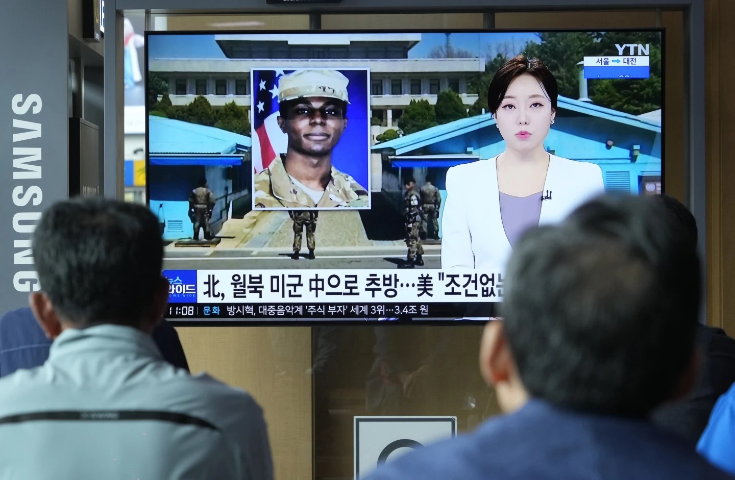 A TV screen showing US soldier Travis King's photo during a news program in Seoul, South Korea on September 28, 2023 (AP)