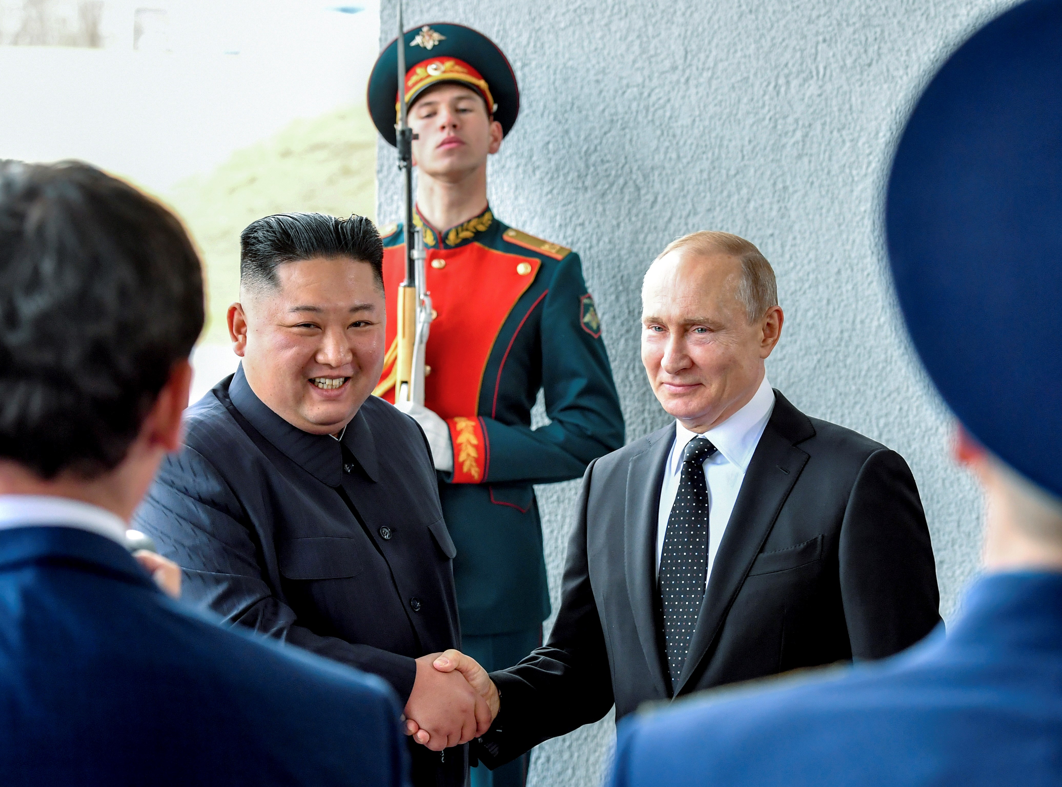 Russian President Vladimir Putin, right, and DPRK's leader Kim Jong Un shake hands during their meeting in Vladivostok, Russia, on April 25, 2019 (Yuri Kadobnov/Pool Photo via AP, File)