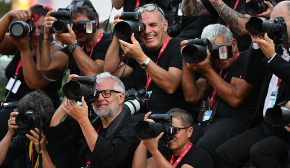 Photographers at Venice Immersive (AFP)
