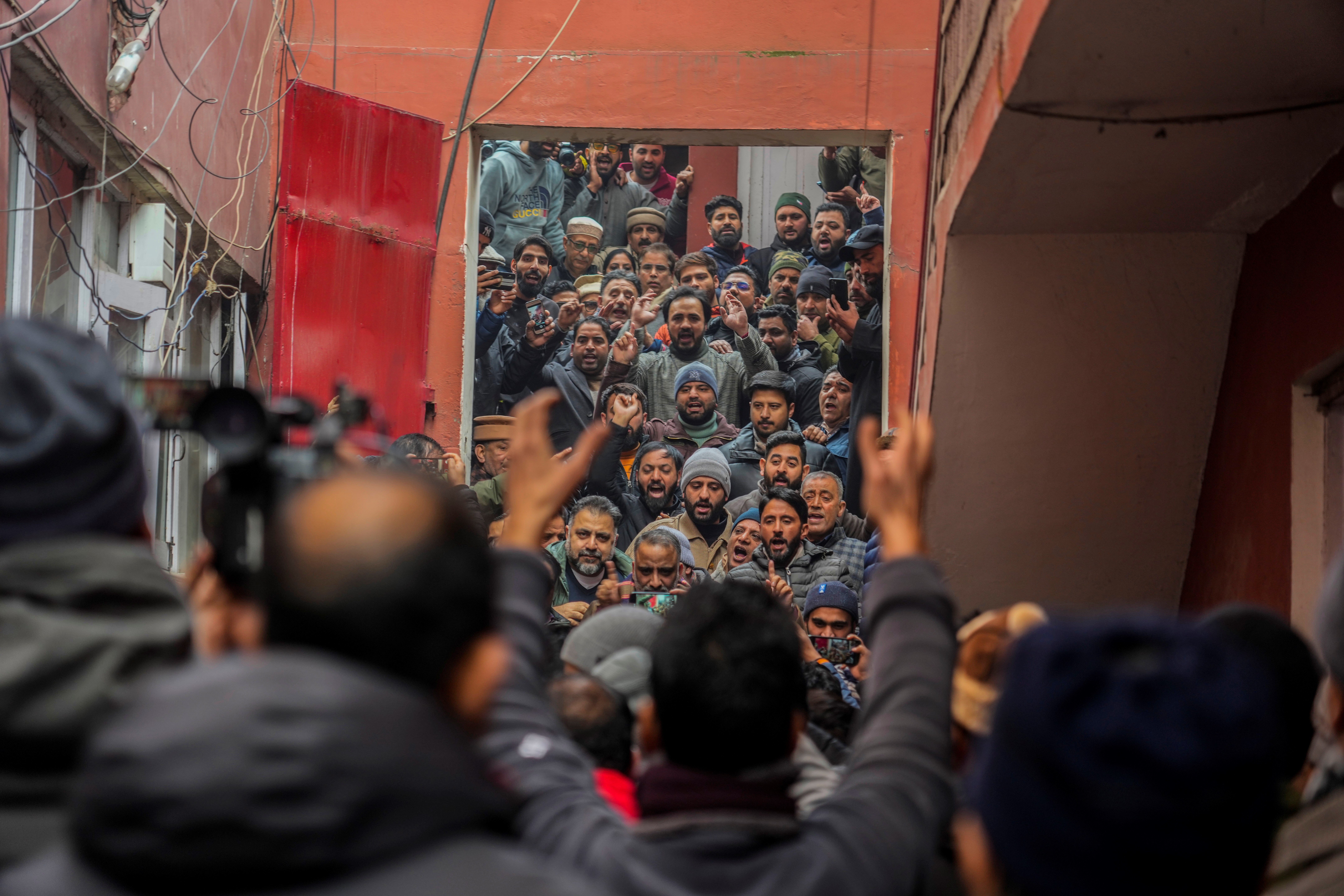 Supporters of Jammu Kashmir National Conference shout slogans during a protest over the death of three civilians killed in army custody, in Srinagar, Indian controlled Kashmir, Dec. 23, 2023. (AP)