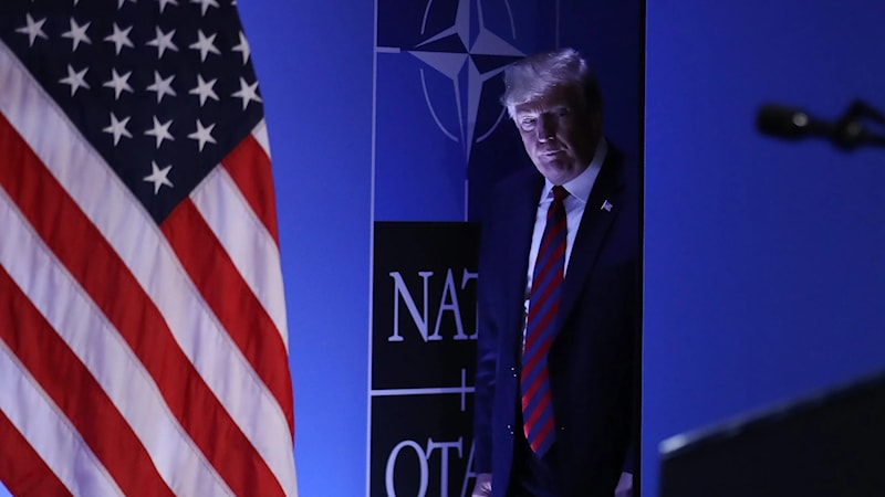 Former US President Donald Trump arrives to speak to the media at a press conference on the second day of the 2018 NATO Summit on July 12, 2018 in Brussels, Belgium. (Getty Images)