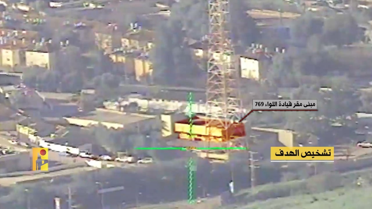 A screengrab from a video published by Hezbollah showing an operation targeting the headquarters of the Israeli occupation forces Eastern Brigade 769 in the 'Kiryat Shmona' barracks. (Military media)