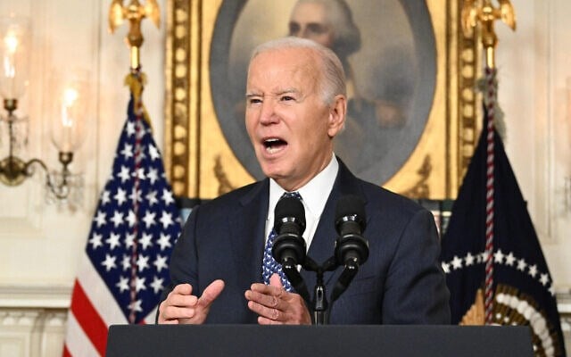 US President Joe Biden answers questions about “Israel” after speaking about the Special Counsel report at the White House in Washington, on February 8, 2024. (AFP)
