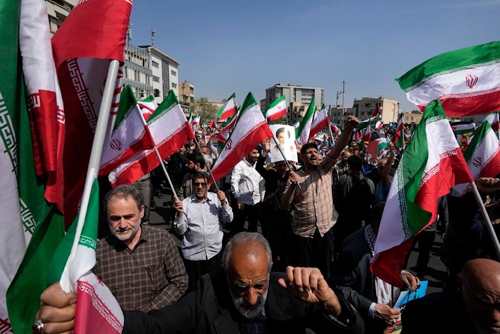 Illustrative: Worshippers chant pro-Palestinian slogans during massive demonstrations after Friday prayer in Tehran, Iran, Friday, April 19,2024. (AP)