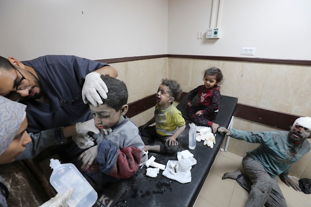 Palestinian children wounded in the Israeli bombardment of the Gaza Strip are treated at al-Aqsa hospital on Deir al-Balah on November 21,2023. (AP)