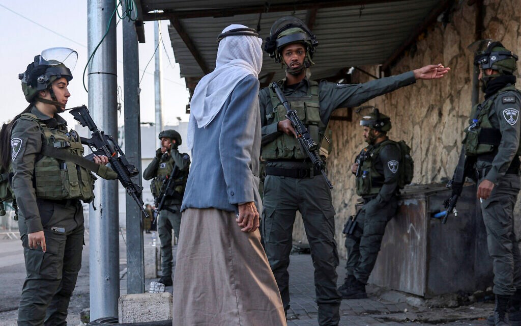 Palestinians cross a checkpoint in Bethlehem, in the West Bank on April 5, 2024, as worshippers head to  Al-Aqsa mosque compound for Friday Noon prayer during the Muslim holy fasting month of Ramadan. (AFP)