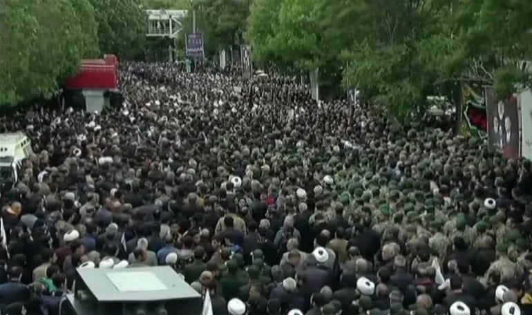 Mourners take part in a procession in Tabriz on May 21, 2024 (Iran Press/AFP)